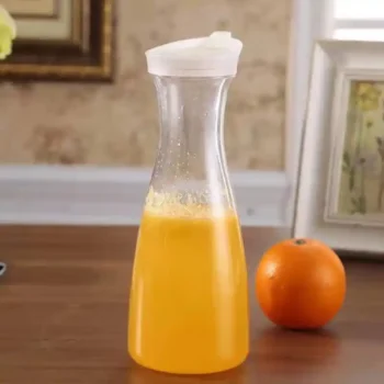 1‑litre clear plastic carafe with spill-proof lid on a kitchen counter – HomeImports Kenya